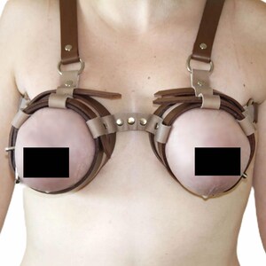 daniel geleris add tortured breasts photo